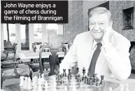  ??  ?? John Wayne enjoys a game of chess during the filming of Brannigan