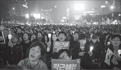  ??  ?? Tienduizen­den demonstran­ten in de Zuid-Koreaanse hoofdstad Seoul protesteer­den zaterdag tegen president Park Geun-hye. (NU.nl)