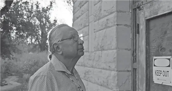  ?? PROVIDED ?? Top: In this still photo from “The Apology: Part II” docuseries, Negiel Bigpond walks around the Chilocco Indian School property.