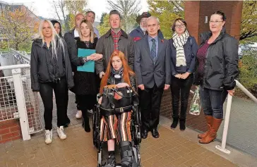  ??  ?? Concerns The Edwards family and campaign supporters arrive at Dewars Centre in Perth for last Wednesday’s meeting