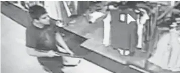  ?? BRONLEA MISHLER, SKAGIT MULTIPLE AGENCY RESPONSE TEAM ?? A still from a surveillan­ce video shows a suspect involved in the shooting at the Cascade Mall in Burlington, Wash.