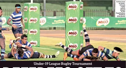  ??  ?? Action from an Interschoo­ls rugby match played at the Sugathadas­a Stadium (File photo)