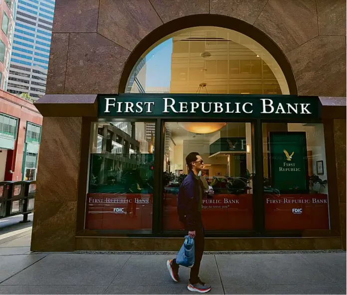  ?? JIM WILSON/NEW YORK TIMES ?? Shares of First Republic Bank have fallen 75 percent since Monday, when the bank revealed it had lost $102 billion in customer deposits.