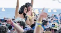  ?? MICHAEL LAUGHLIN/SOUTH FLORIDA SUN SENTINEL ?? Thousands of music fans enjoy a day on the beach during the Tortuga Music Festival on April 13, 2019, at Fort Lauderdale beach.