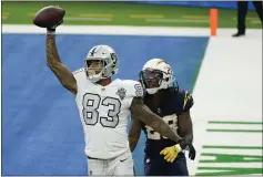  ?? ALEX GALLARDO — THE ASSOCIATED PRESS, FILE ?? Raiders tight end Darren Waller reacts after scoring a touchdown during the second half against the Chargers on Nov. 8 in Inglewood.