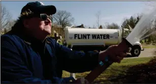  ?? Briarcliff Entertainm­ent/GathrFilms ?? The Flint, Michigan, water crisis prompted filmmaker Michael Moore to visit his home town in his latest documentar­y, “Fahrenheit 11/9.”