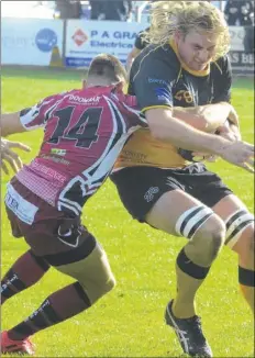  ?? Picture: Chris Davey FM4543776 ?? Royce Cadman takes a tackle against Taunton