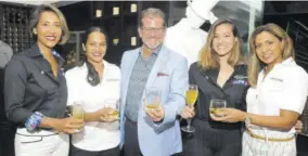  ??  ?? Flanking Johnnie Walker Reserve Brand Ambassador Arturo Savage, with whisky (both neat and in cocktails) in hand were members of the JFDF organising team (from left) Festival Manager Nasma Chin, Festival Director Alicia Bogues, Project Specialist Brittany Ho, and Project Manager Nicole Pandohie.