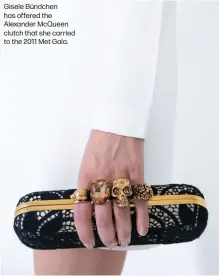  ??  ?? Gisele Bündchen has offered the Alexander McQueen clutch that she carried to the 2011 Met Gala.