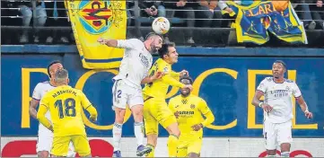  ?? AFP ?? Real Madrid's Dani Carvajal (L) vies with Villarreal's Spanish midfielder Manuel Trigueros during the Spanish league match.