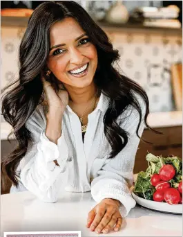  ?? ?? Above: Atlanta-based Palak Patel offers approachab­leplant-based Indian recipes inher debut cookbook “Food is Love.” The book is organized into nine chapters that explore the connection between what you serve and eat and how you feel.