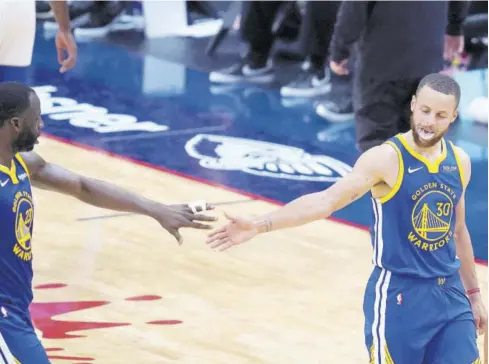  ?? (Photos: AP) ?? Golden State Warriors guard Stephen Curry (30) celebrates with forward Draymond Green (23) in the second half of an NBA basketball game against the New Orleans Pelicans in New Orleans, Tuesday, May 4, 2021.