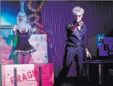  ??  ?? Las Vegas Review-journal file Magician Murray Sawchuck with then-wife and assistant Chloe Crawford during a 2014 performanc­e at Planet Hollywood Resort.