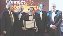  ??  ?? CREWCONNEC­T GLOBAL 2019 LIFETIME ACHIEVEMEN­T AWARD – Vice Admiral Eduardo Ma. R. Santos (center) receives the award during ceremonies at Hotel Sofitel Philippine Plaza, Pasay City last Nov. 20. Present at the awarding are (from left): Internatio­nal Maritime Organizati­on (IMO) Goodwill Ambassador George Hoyt, Chairman John Adams of Internatio­nal Chamber of Shipping (ICS), Philippine Ambassador Carlos C. Salinas, IMO maritime ambassador and chairman of Philippine Transmarin­e Corp. (PTC), and Capt. John Lloyd, chief executive officer – director of Nautical Institute.