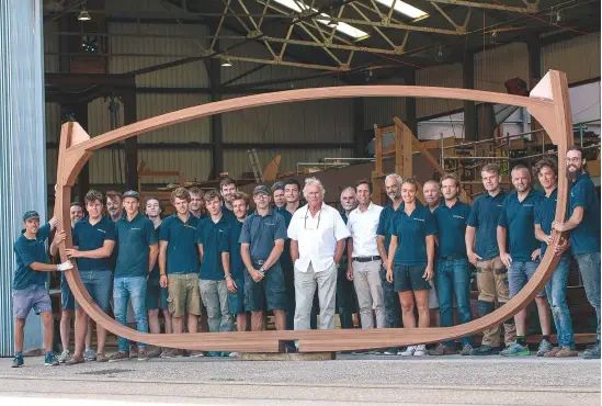  ??  ?? Spirit Yachts’s workforce with one of the laminated sapele frames of the Spirit 111