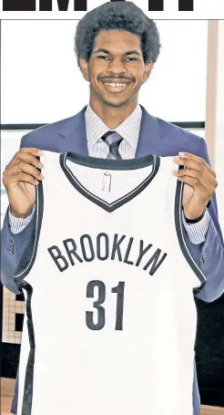  ?? N.Y. Post: Charles Wenzelberg ?? ALL SMILES: Nets first-round pick Jarrett Allen thought he was going to be drafted earlier, but is glad he’s in Brooklyn.