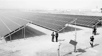  ??  ?? A general view shows part of a new solar plant at the Zaatari refugee camp. — AFP photo