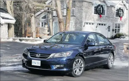 ?? CHRIS CHASE, SPECIAL TO THE GAZETTE ?? The 2013 Honda Accord, in Sport trim, is powered by a four-cylinder engine that produces 189 horsepower and 182 foot-pounds of torque.