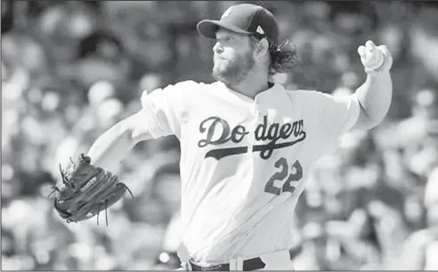  ??  ?? Bringing the heat: In this Oct. 11, 2016, file photo, Los Angeles Dodgers starting pitcher Clayton Kershaw throws against the Washington Nationals during the first inning in Game 4 of the National League Division Series in Los Angeles. The Chicago Cubs...
