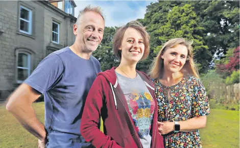  ??  ?? Celebrity aid: Laura, centre, with father, Mark and mother, Nicola. Below, Peter Kay, who cancelled all future work in 2017, is performing two shows to raise money