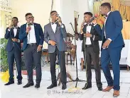  ??  ?? That Emeralds ministerin­g at a church recently (from left), Shane Cole, Rajae Danvers, Miguel Britton, Jevaugh Dyce and Mario Morris.