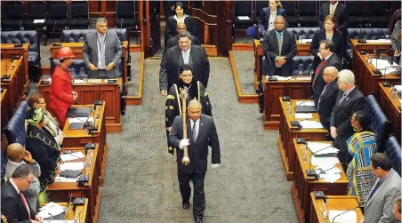  ?? PICTURE: DAVID RITCHIE ?? SEAT OF POWER: Members of Western Cape Legislatur­e stand as the Speaker is led into the house.