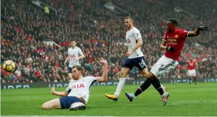  ?? Reuters ?? Manchester United’s Anthony Martial scores the winner against Tottenham Hotspur during the Premier League match. —