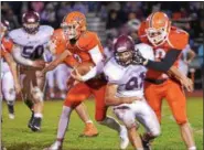  ?? DFM FILE ?? Perkiomen Valley quarterbac­k Cole Peterlin looks for running room on a carry against Pottsgrove during last year’s PAC championsh­ip game.