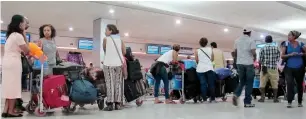  ?? — File photo ?? Reduced queue times helped improve passenger traffic at Dubai internatio­nal airport.