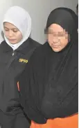 ??  ?? The former assemblywo­man (right) will be investigat­ed under Section 23 of the MACC Act. — Bernama photo