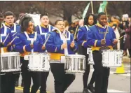  ?? Brian A. Pounds / Hearst Connecticu­t Media ?? The Harding High School marching band participat­es in the governor’s inaugural parade in Hartford Wednesday.