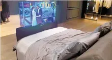  ?? Korea Times photo by Kim Hyun-bin ?? A 55-inch OLED TV appears on the bed’s footboard, which is capable of analyzing the user’s sleep pattern and displaying weather, upcoming schedule, movies and TV programs is seen at the LG Science Park in Seoul, Tuesday.