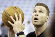  ?? RICK BOWMER — THE ASSOCIATED PRESS ?? Clippers’ forward Blake Griffin shoots during practice before a first-round game against the Utah Jazz, in Salt Lake City. Griffin is out for the remainder of the playoffs after injuring his big toe during Friday night’s win against Utah.