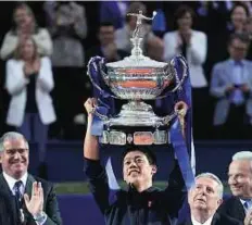  ?? AP ?? Kei moment Kei Nishikori of Japan lifts his trophy after winning the Barcelona Open tennis tournament on Sunday.