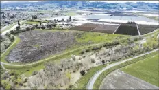  ?? CALIFORNIA STRAWBERRY COMMISSION VIA AP ?? This photo provided by the California Strawberry Commission shows a flooded Pajaro River area in Pajaro, Calif. on Tuesday.