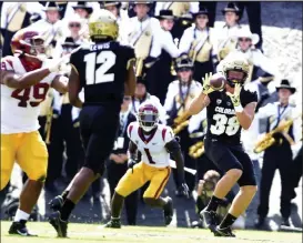  ?? Cliff Grassmick / Staff Photograph­er ?? Colorado head coach Karl Dorrell said Brady Russell, right, has shown leadership qualities at times but hopes more offensive players use their voices as the Buffs work through their struggles.