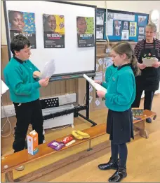  ??  ?? Engaged in fun learning activities Corrie Primary pupils act out a short sketch.