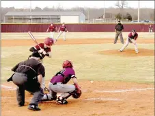  ?? MARK HUMPHREY ENTERPRISE-LEADER ?? Lincoln sophomore Noah Moore makes a big block while playing catcher to hold a runner at second during the Wolves’ 6-5 eight inning victory over visiting Lifeway Christian Schools, of Rogers, on Monday, March 11. Moore drove in the winning run when he singled into center field.