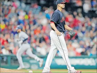 ?? [TONY DEJAK/THE ASSOCIATED PRESS] ?? Indians pitcher Carlos Carrasco waits for the Mariners’ Ben Gamel to finish his home run trot during the sixth inning.