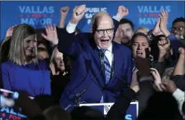  ?? NAM Y. HUH — THE ASSOCIATED PRESS ?? Chicago mayoral candidate Paul Vallas, center, celebrates with supporters as his wife, Sharon Vallas, left, looks on at his election night event in Chicago on Tuesday.