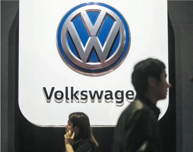  ?? QILAI SHEN / BLOOMBERG ?? Volkswagen, taking part in the Auto Shanghai show this week, has been fined US$2.8 billion after pleading guilty in its emissions tests scandal.