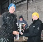  ?? ?? Alasdair Day of R&B Distillers, right, presenting Murray Barbour with the John McKay Cup.
