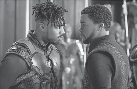  ??  ?? Erik Killmonger (Michael B. Jordan) and T’Challa (Chadwick Boseman) don't see eye to eye in “Black Panther.'” MATT KENNEDY/MARVEL
