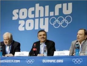  ?? MARK HUMPHREY — THE ASSOCIATED PRESS ?? NHL Players’ Associatio­n Executive Director Don Fehr, left, Internatio­nal Ice Hockey Federation President Rene Fasel, center, and NHL Commission­er Gary Bettman, right, answer questions during a news conference at the 2014 Winter Olympics in Sochi,...