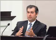  ?? File, Grace Beahm / Post and Courier via AP ?? Former North Charleston police officer Michael Slager testifies during his murder trial at the Charleston County court in Charleston, S.C. Slager was sentenced to 20 years in prison Thursday for the 2015 fatal shooting of unarmed black motorist Walter...