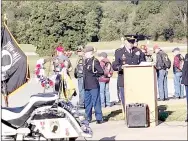  ?? PHOTO SUBMITTED ?? SFC Eric Corcoran speaks during Saturday’s Chris Marion memorial ceremony at McDonald County High School.