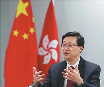  ?? ZOU HONG / CHINA DAILY ?? John Lee Ka-chiu, incoming chief executive of the Hong Kong Special Administra­tive Region, speaks during an interview with media in Hong Kong on June 7.