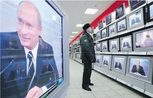  ?? DENIS SINYAKOV / AFP / GETTY IMAGES ?? Canada is being urged to help with a European project aimed at giving Russians a voice other than that approved by President Vladimir Putin.
