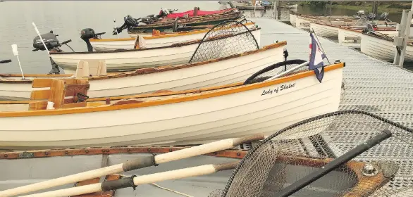  ??  ?? A line of rowboats awaits members of the Tyee Club in Campbell River. To qualify as a Tyeeman, anglers must catch a minimum 30-pound chinook salmon, and follow several strict regulation­s.