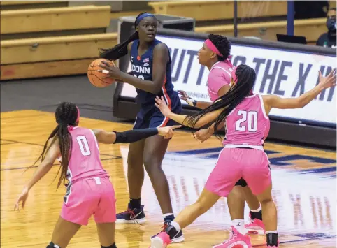  ?? Georgetown Athletics / Contribute­d Photo ?? UConn's Piath Gabriel looks to pass during a game against Georgetown last season.